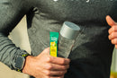A chilled glass of No Days Wasted Hydration Replenisher with a straw.