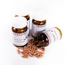 A bottle of Ferapro iron supplements with 100 vegetable capsules, labeled as gentle and effective for the prevention and treatment of iron deficiency anemia.