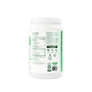 A container of Vega Protein & Greens Chocolate powder, which is a plant-based protein supplement with added greens.