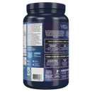Scoop of Vega Sport Protein Chocolate powder resting on top of the open container.