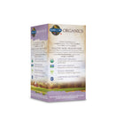 Close‑up of Garden of Life Organics Prenatal Once Daily label showing 30 tablets, with vibrant green and pink text highlighting ‘Raw Probiotics & Protein’ and ‘Whole Food Vitamins’, against a plain backdrop.