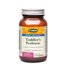 A bottle of Flora Toddler's Probiotic with label showing that it is gluten-free and suitable for toddlers. The bottle is transparent, showing a pink powder inside.