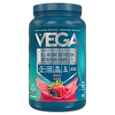 A container of Vega All in One Nutritional Shake in Mixed Berry flavor. The container is white with green and red branding and product information.3