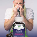 Sambucus Immune Support bottle featuring elderberry extract and immune-boosting ingredients like vitamin C and zinc.